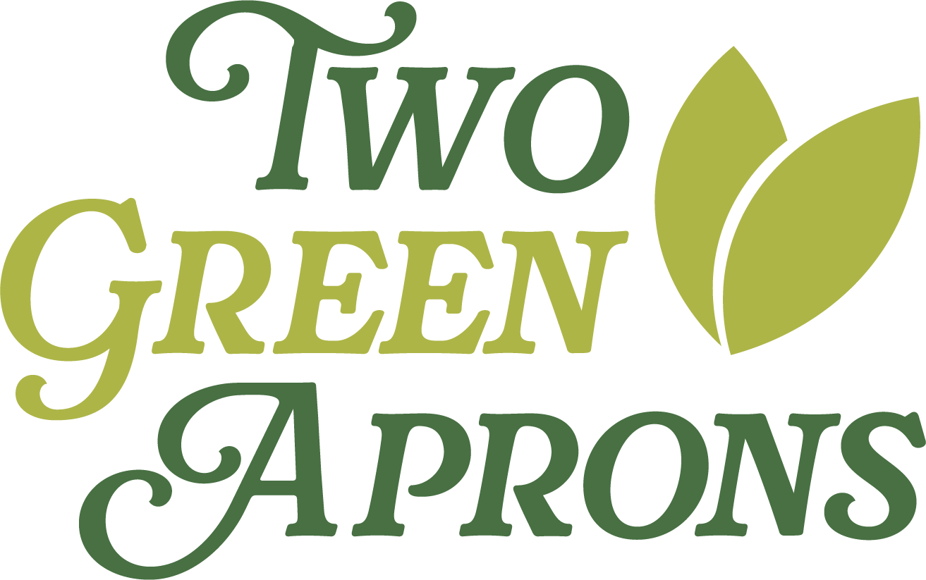 Two Green Aprons logo with stylized green lettering and leaf design